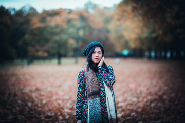 Charming Asian woman portrait in autumn season