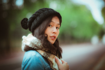 Naklejka premium Charming Asian woman portrait in autumn season