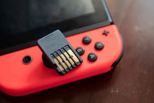 Bangkok, Thailand - November 10, 2019: Nintendo Switch's game cards are coated with a bittering agent, Denatonium Benzoate, so children won&rsquo;t put the game cards in their mouths.