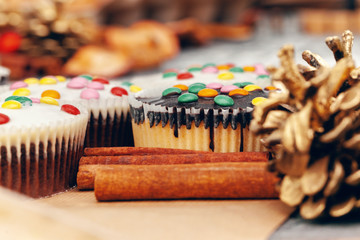 Christmas muffins with icing close up on table
