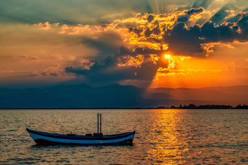 boat and sea at sunset