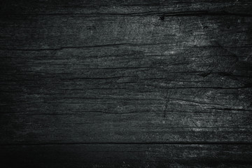 texture wood old grain texture, black dark wall background, top view of wooden table. background in vintage retro color Matte black.