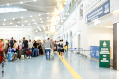 People In Airport Terminal,blurred Background Wall Mural | Wallpaper