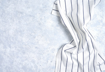 white striped kitchen towel, isolated on white background