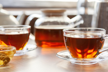Close up of glass tea cup with honey