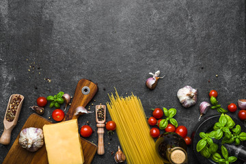 Italian food ingredients: pasta, parmesan, tomatoes, basil, olive, oil