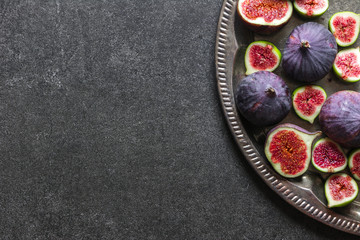 Fresh figs slices. Purple fig, top view.
