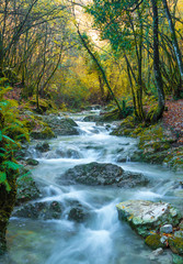 Obraz premium Monte Tancia (Rieti, Italy) - The suggestive waterfalls of torrent Galantina in the Appennini mountains, named Pozze del Diavolo, during the autumn with foliage
