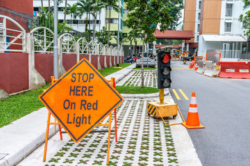 Stop here on red traffic light sign