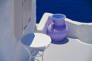 Amazing view over Oia town with blue domes, roofs and churches in amazing travel and honeymoon...