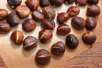 roasted chestnut on wood background