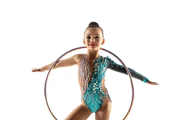 Foto op Plexiglas anti-reflex Little flexible girl isolated on white studio background. Little female model as a rhythmic gymnastics artist in bright leotard. Grace in motion, action and sport. Doing exercises with the hoop. © master1305