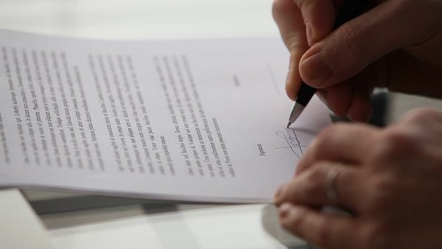 signature, close up of pen signing contract, hands of business man