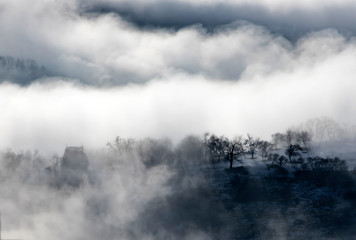 Misty morning in the mountains in autumn.
