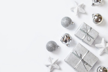 Christmas decorations on white background, top view.