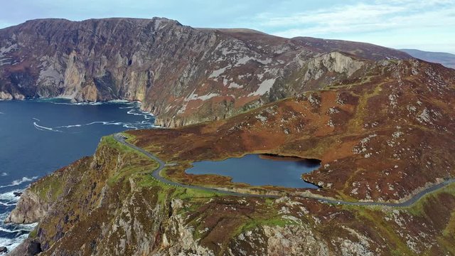 Aerial of Slieve League Cliffs are among the highest sea cliffs in Europe rising 1972 feet or 601 meters above the Atlantic Ocean - County Donegal, Ireland