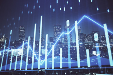 Financial graph on night city scape with tall buildings background multi exposure. Analysis concept.