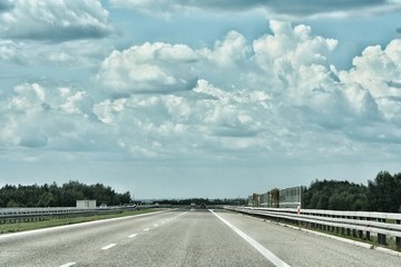 Fototapeta premium Empty highway asphalt road and beautiful sky sunset landscape
