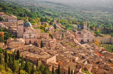 View of Assisi charming historic center and Umbria countryside seen from above with St Rufinus...