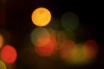 Bokeh with colorful spherical lights alternating with the background image