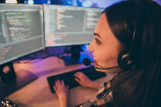 Close up photo of cheerful monitor positive cute nice girl with headphones on her head overtime hard-working smiling toothily developing new software