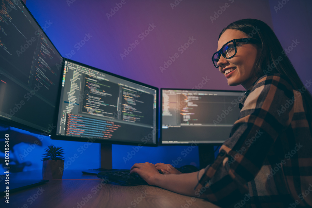 Poster low below angle view photo of cheerful woman finishing developing computer game solving all the curr