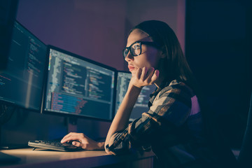 Side profile photo of intelligent thinking guessing woman working in late evening shift instead of her colleague system administrator