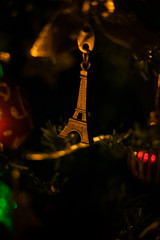 toy eiffel tower on christmas tree