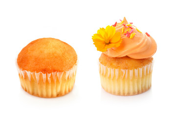 mini cup cakes decorated with whipped cream and sugar sparkles