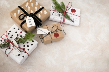 New Year's Christmas stylish handmade gifts on a light background. Copy space.