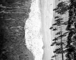 Black and white aerial photo of a beach in Hawaii