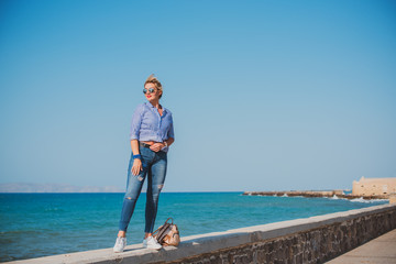 Nice woman on a nature background. Concept of freedom and relax