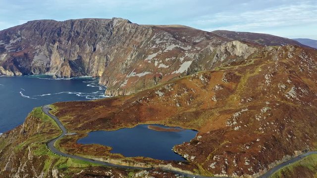 Aerial of Slieve League Cliffs are among the highest sea cliffs in Europe rising 1972 feet or 601 meters above the Atlantic Ocean - County Donegal, Ireland