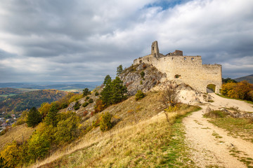 Fototapeta na wymiar Cachtice castle with surrounding landscape in autumn time, Slovakia, Europe.