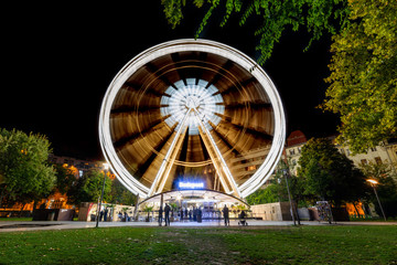 Budapest, Hungary - October 01, 2019: Budapest Eye (ferris wheel) at Erzsebet Square. Luminous...