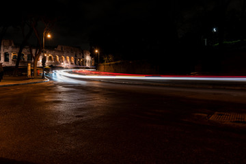 Fototapeta na wymiar light trails of the cars in the way of the imperial holes, Rome