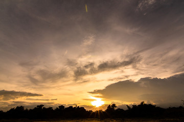 The clouds of black rain gathered in the evening. And evening light in Thailand