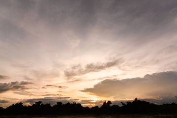 The clouds of black rain gathered in the evening. And evening light in Thailand