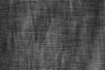 Texture of old dark jeans for background.