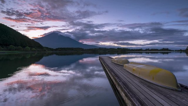 Sunrise at Tanuki Lake with boats and pier and Mt Fuji in Fujinomiya Shizuoka Japan