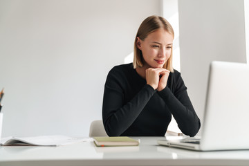 Confident attractive young business woman