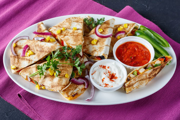 mexican chicken quesadilla with veggies, top view