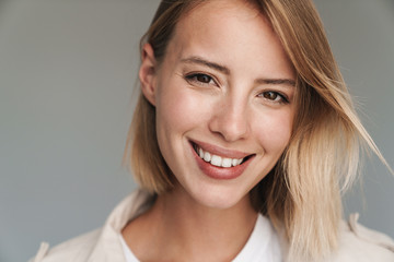 Close up of a lovely young blonde short haired woman