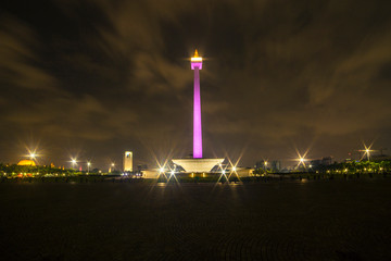 Jakarta Indonesia Monas (Monumen Nasional) obelisk on Merdeka Square. Nighttime