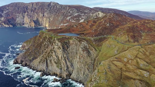 Aerial of Slieve League Cliffs are among the highest sea cliffs in Europe rising 1972 feet or 601 meters above the Atlantic Ocean - County Donegal, Ireland