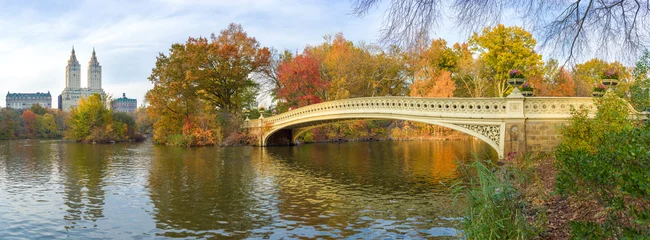 Foto op Canvas New York City Central Park fall foliage at Bow Bridge pond © blvdone