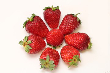 8 strawberries on a white background