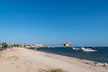 Sidewalk on the river bank of the city of Santarem, Para, Brazil and Rio Tapajos on sunny summer...