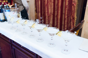 Martini glasses for alcoholic drinks at a party
