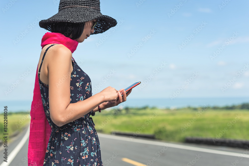 Poster woman walk and use a cellphone